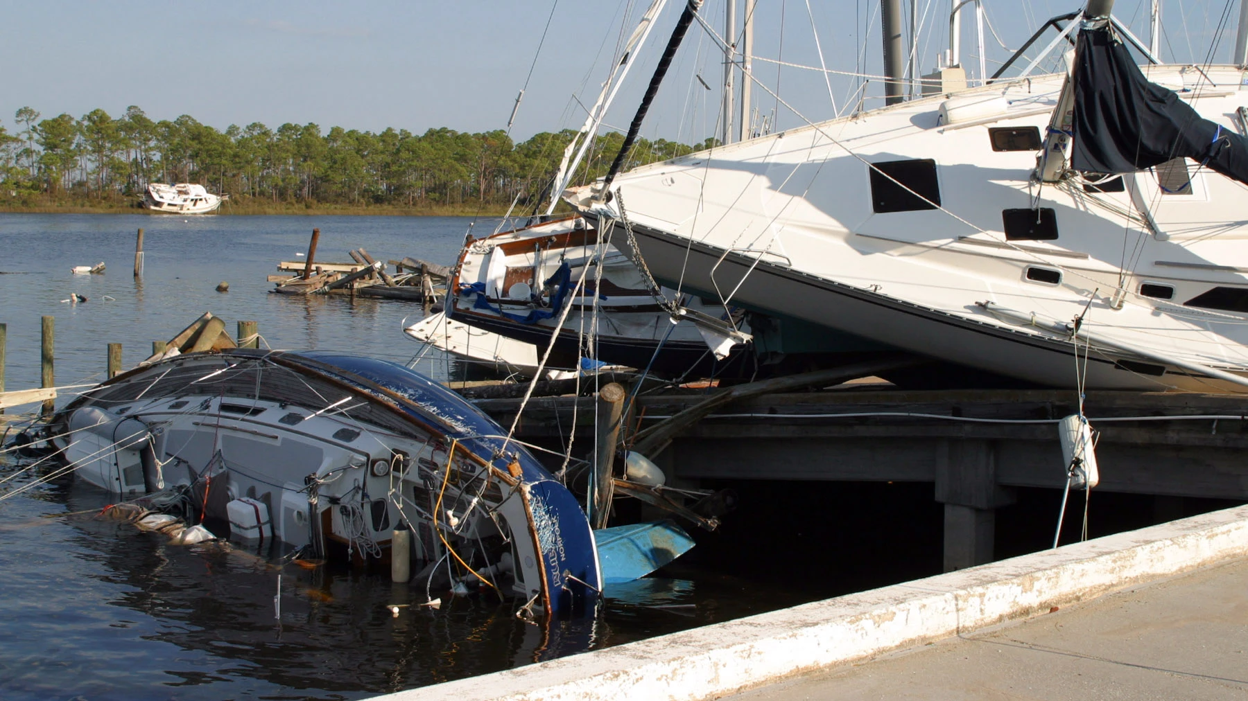 Hurricane Ivan sunk and stacked boats at Bayou Grande Marina on board Naval Air Station